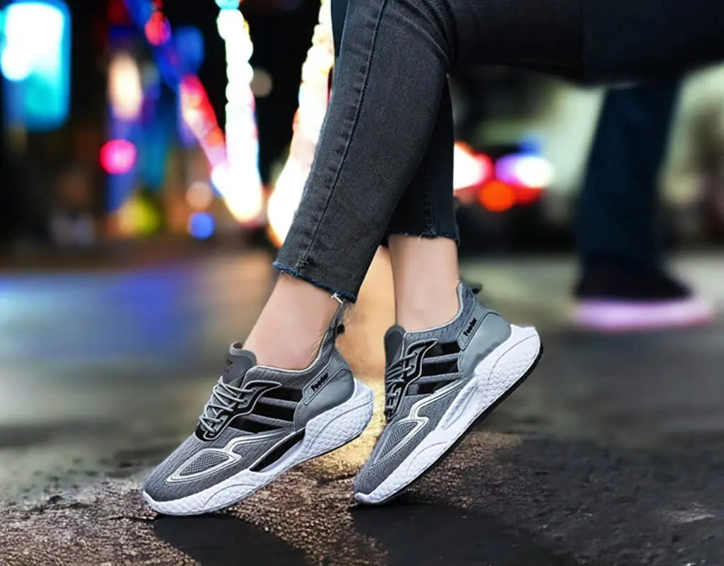 Grey running sneakers, air cushioning, elastic closure lightweight stretchable design